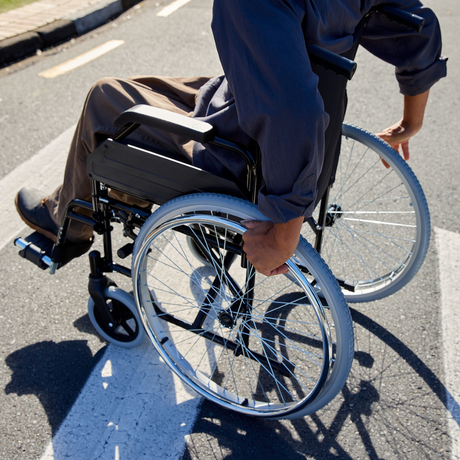 Self-Propelling Wheelchair